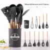 Complete 12 piece black silicone kitchen utensil set with wooden handles and storage container