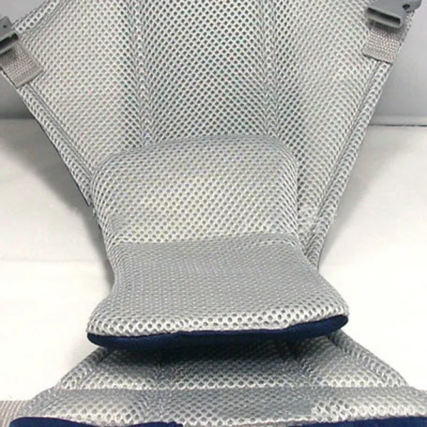 Close-up of breathable mesh inner lining in baby carrier for added comfort and ventilation