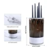 Compact electric makeup brush cleaner with 16cm height, USB charging cable, and durable ACS body material.