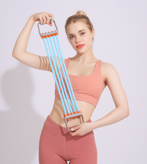 Fitness woman demonstrating 5-tube silicone adjustable chest expander for strength training