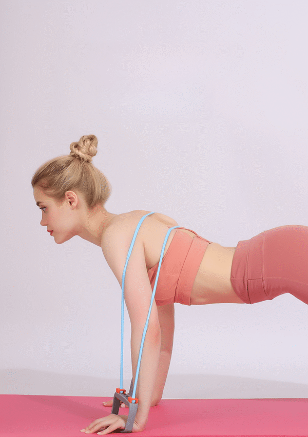 Woman using adjustable silicone chest expander in push-up position for full body resistance training