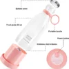 Labeled diagram of portable electric juicer bottle with stainless steel blades, food-grade AS jar, and power button