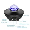 Galaxy star projector with labeled features including USB port, brightness adjustment, Bluetooth and power buttons