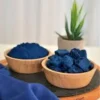 Natural Nila Powder and Indigo Chunks in Wooden Bowls – Organic Skin Brightening Ingredient.